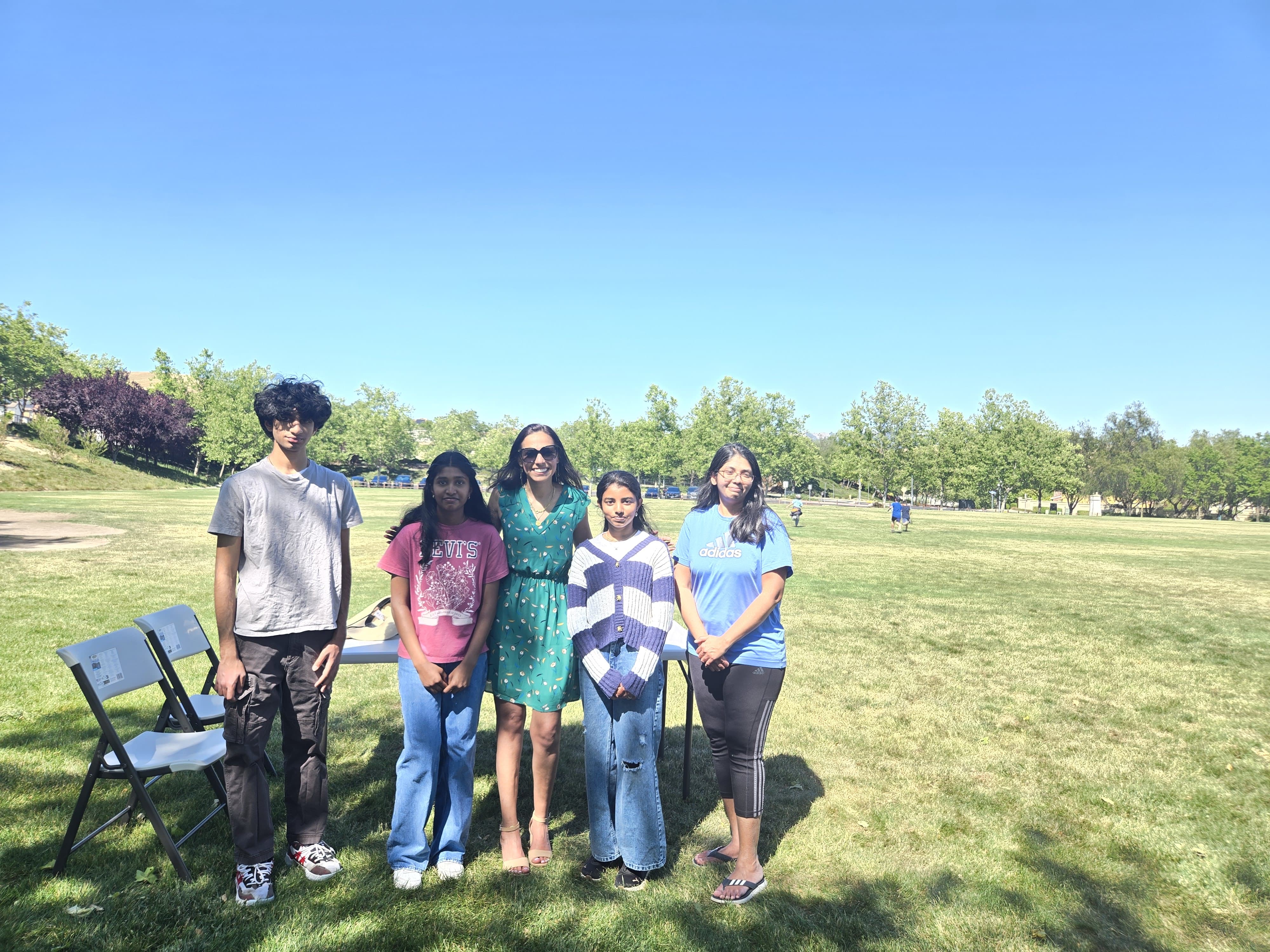 Students and instructors at outdoor award ceremony
