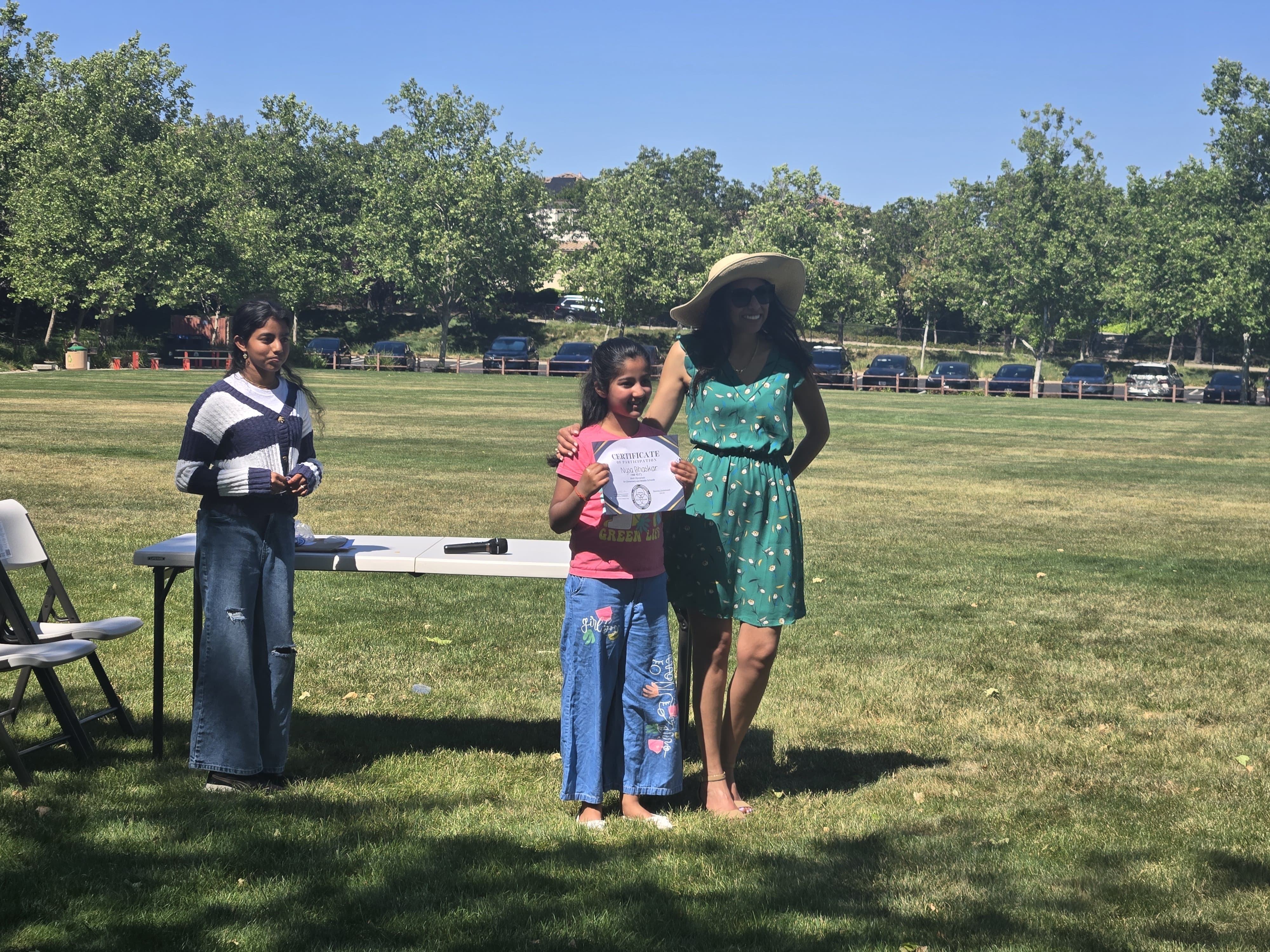 Student receiving certificate at award ceremony
